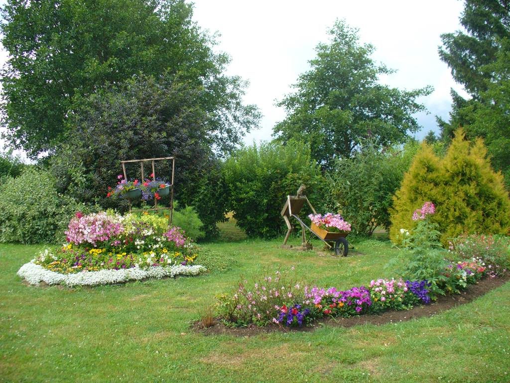 OSNES, Village Fleuri "3 Fleurs"